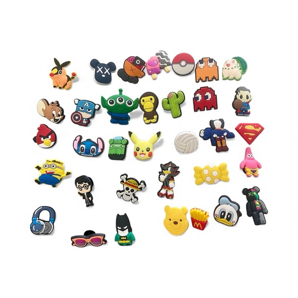 CROCS Other - 34 Croc Charms! New! All different characters! Buy the whole lot for $20!